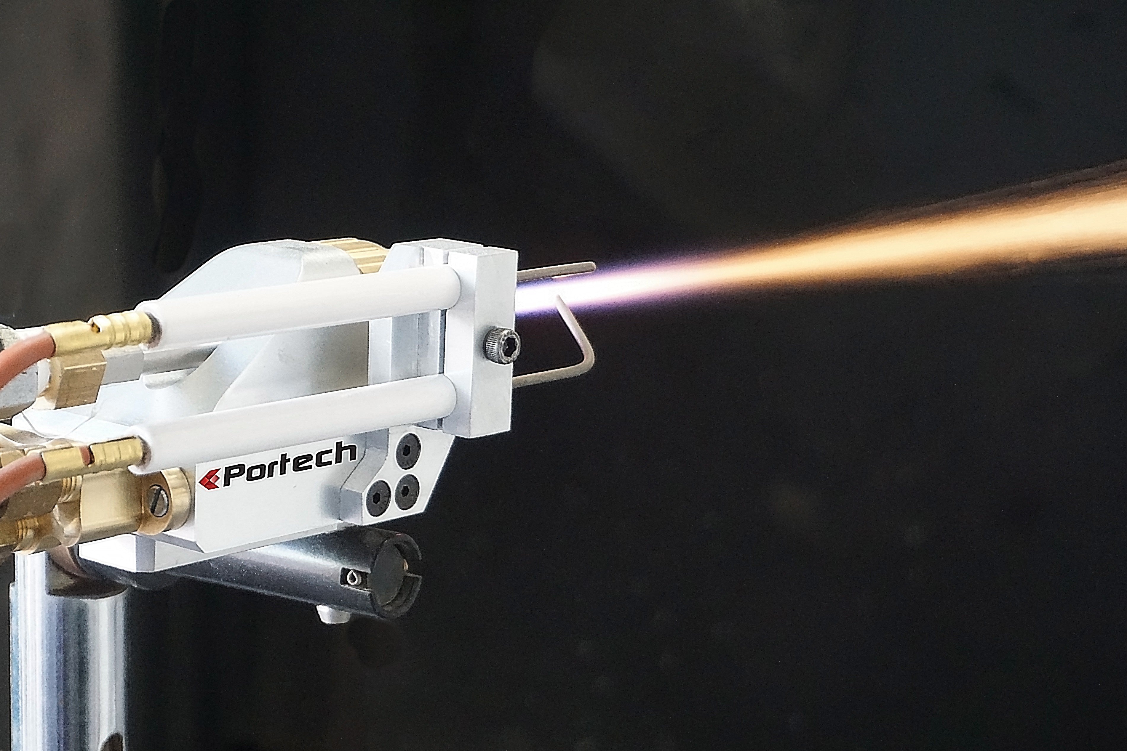 Thermal Spray Torch is spraying metal powder on a surface.