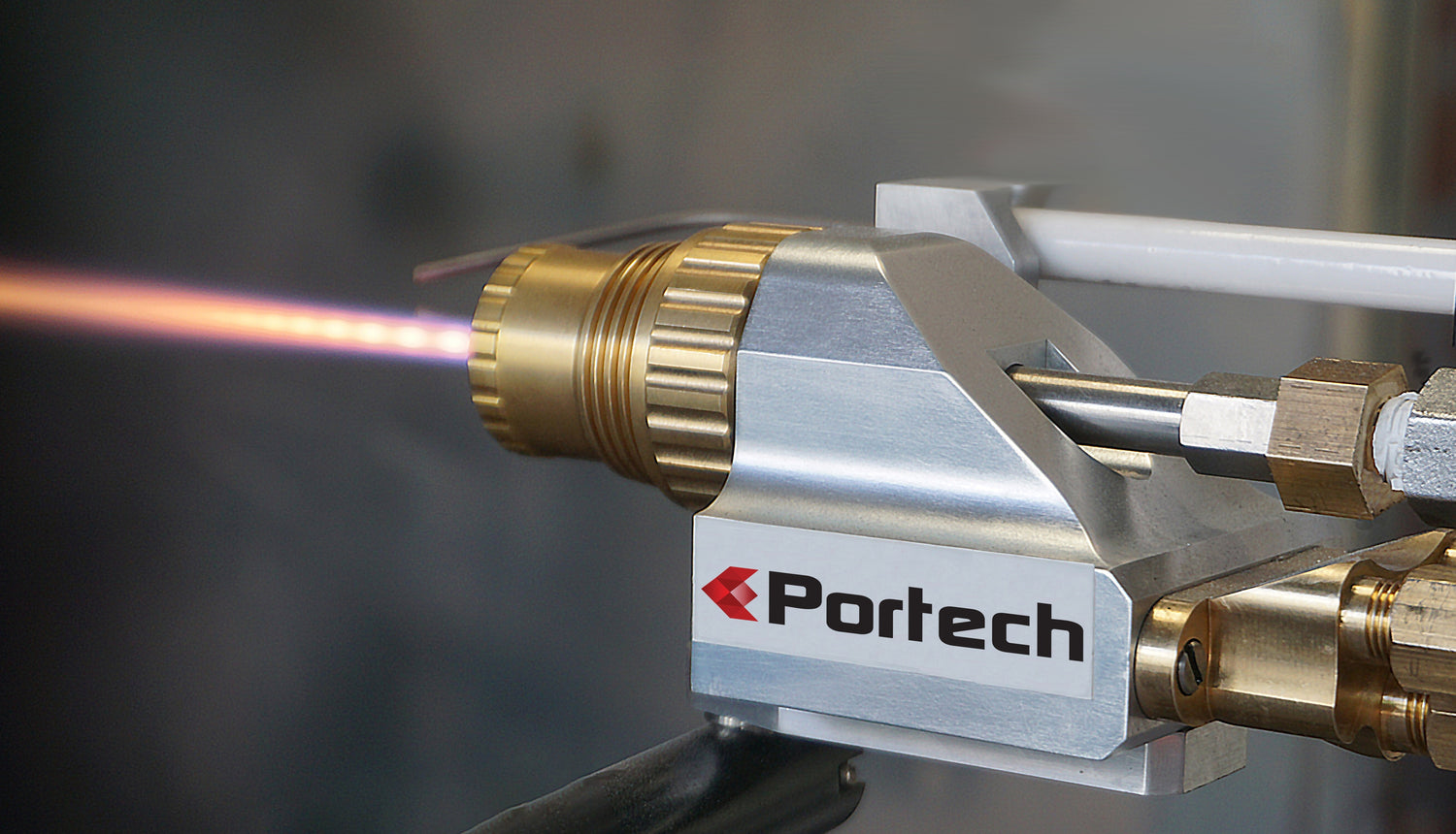 Thermal Spray Coating Torch is spraying metal powder on a metal surface.